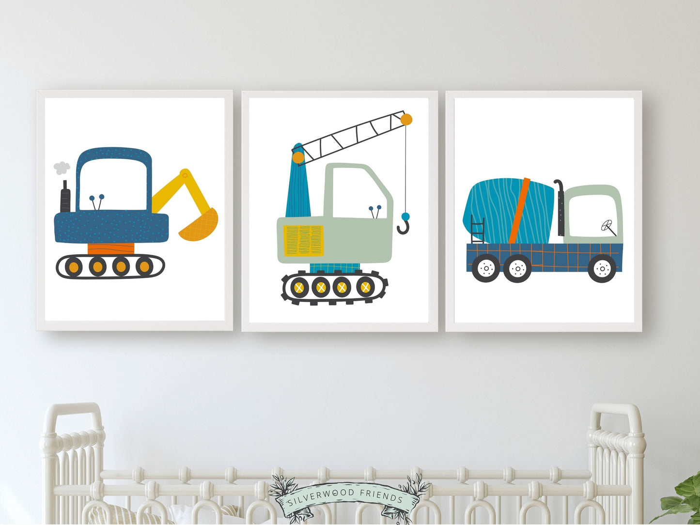 Our delightful Set of 3 Construction Nursery Prints features colorful blue digger trucks. Perfect for your construction truck nursery decor! Each print showcases a different digger truck and is perfect for your little boys nursery decor.