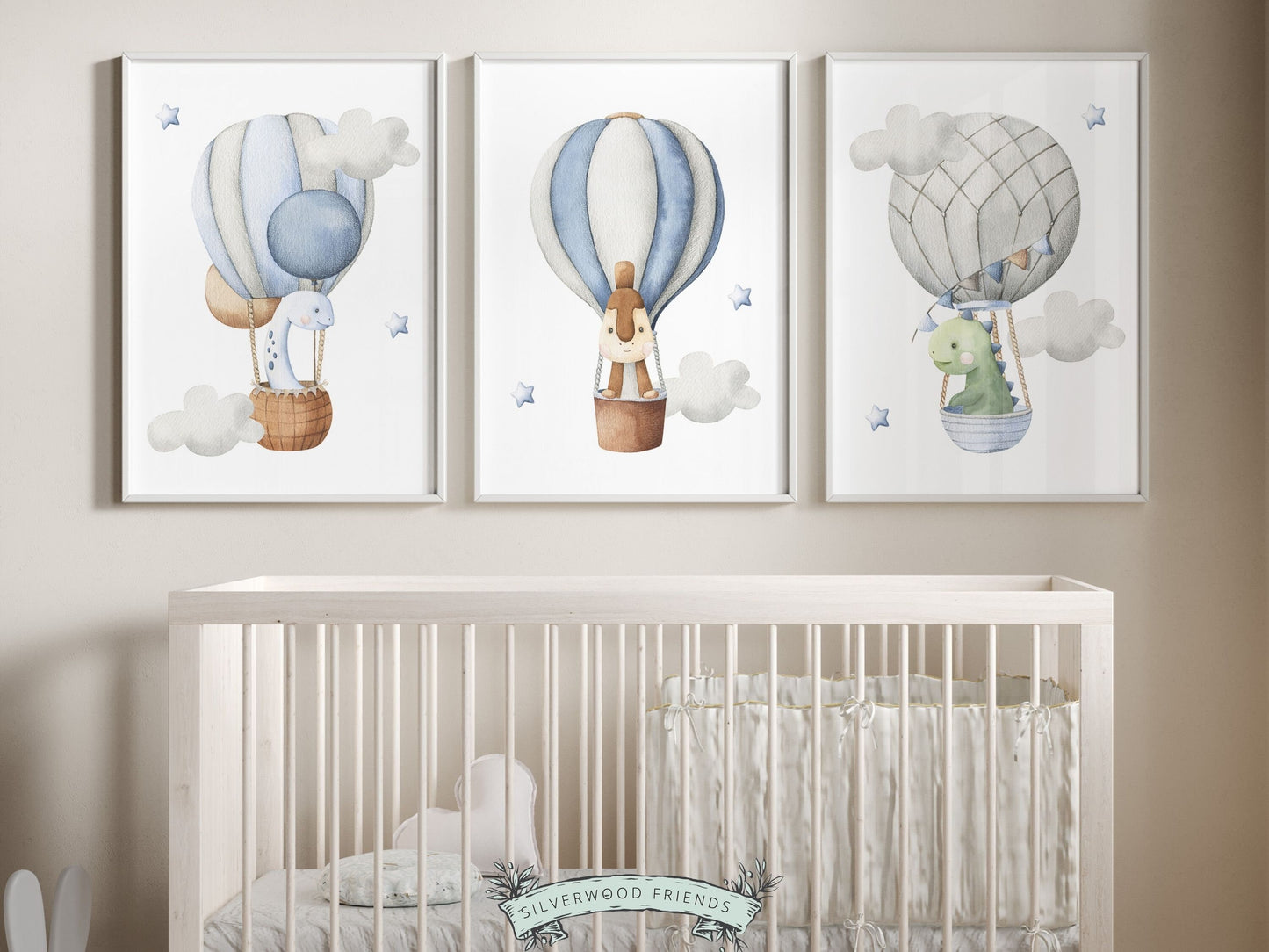 Our delightful Set of 3 Dinosaur Nursery Prints features watercolor dinosaurs in hot air balloons amongst stars and clouds. Perfect for your dinosaur theme nursery or as an adorable dinosaur baby shower gift.