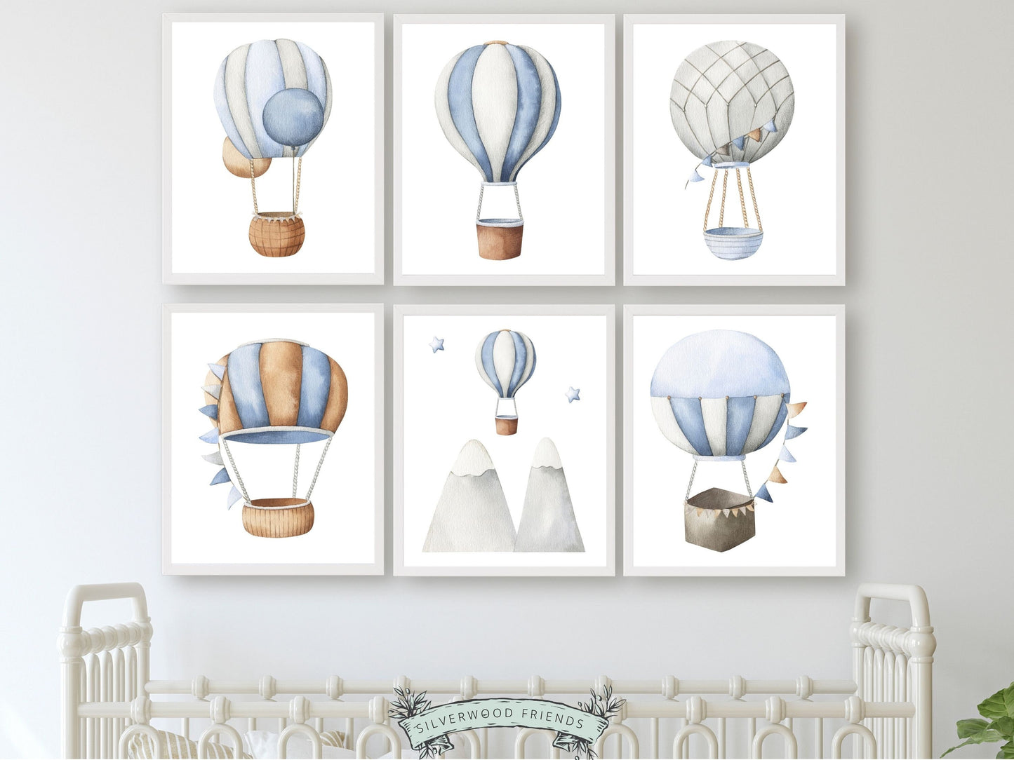 Our Hot Air Balloon Nursery Prints featuring watercolor hot air balloons soaring through the sky will create a calm and cosy space for your little one and is perfect for your boys transport nursery decor and also makes a lovely baby shower gift.
