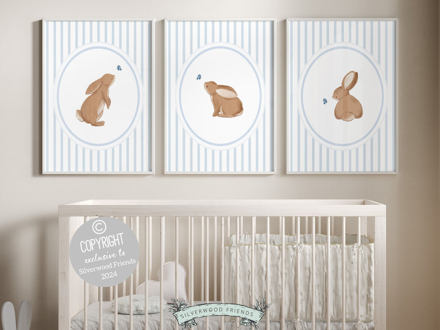 Our gorgeous Bunny Nursery Print Set of 3, showcasing adorable bunny rabbits and blue butterflies with baby blue chinoiserie wallpaper pattern, is perfect for your woodland nursery decor and makes a unique baby shower gift for both boys and girls.