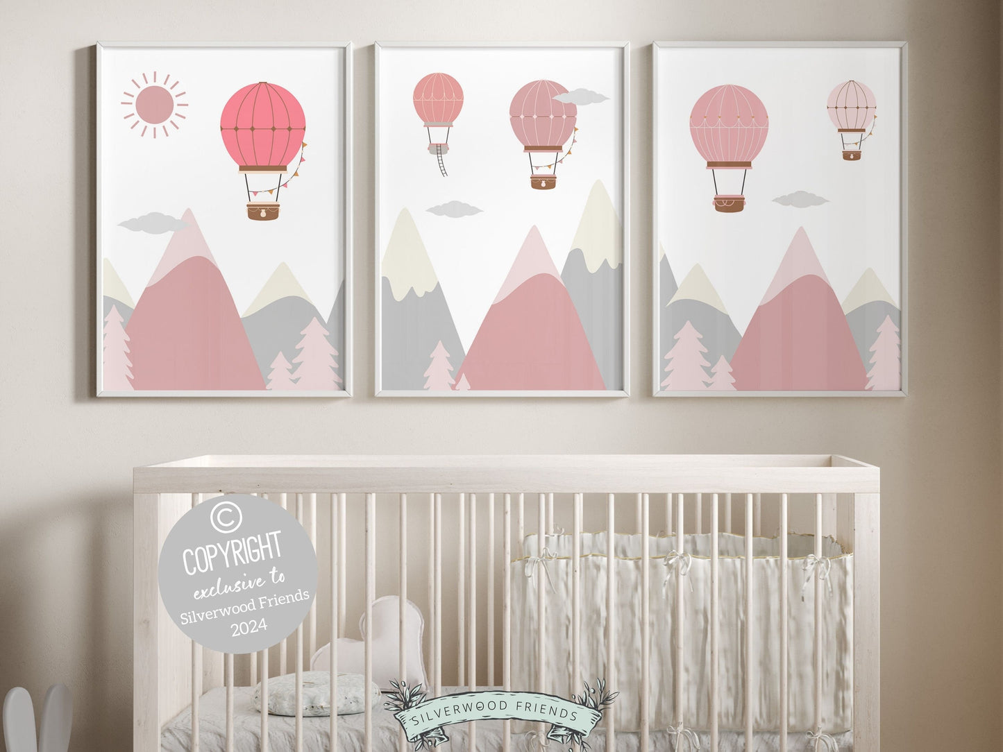 Hot Air Balloon Nursery Prints, featuring charming balloons soaring above mountains and forests in soothing blush pink tones. Perfect for your baby girls adventure nursery and also as a unique and thoughtful baby shower gift.