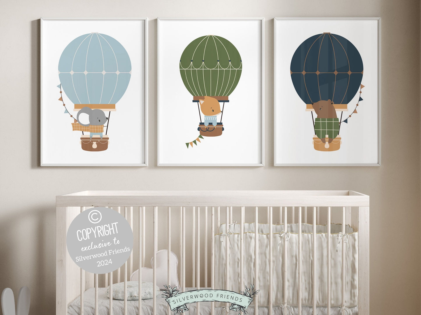 Hot Air Balloon Nursery Prints featuring woodland animals bear, mouse and fox in hot air balloons in a calming blue, green and beige color palette. Perfect for your woodland nursery decor or transport theme room and makes a unique baby shower gift.