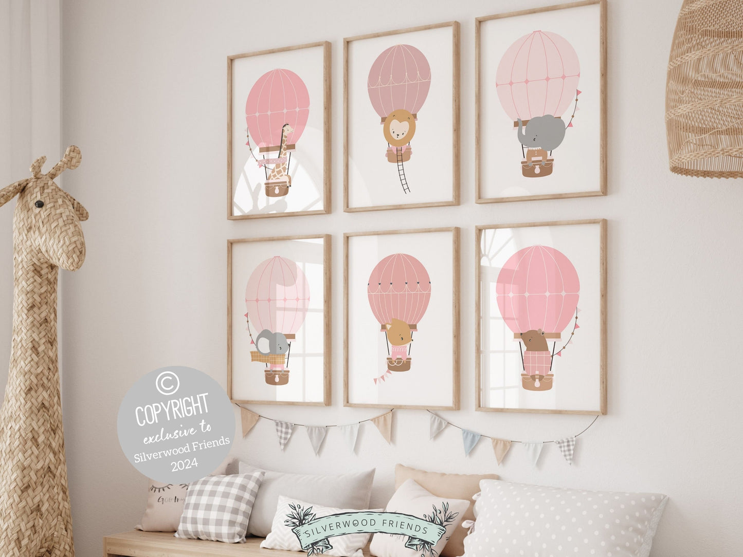 Hot Air Balloon Nursery Prints, featuring charming woodland and safari animals in hot air balloons in soothing blush pink tones. Perfect for your baby girls adventure nursery and also as a unique and thoughtful baby shower gift.