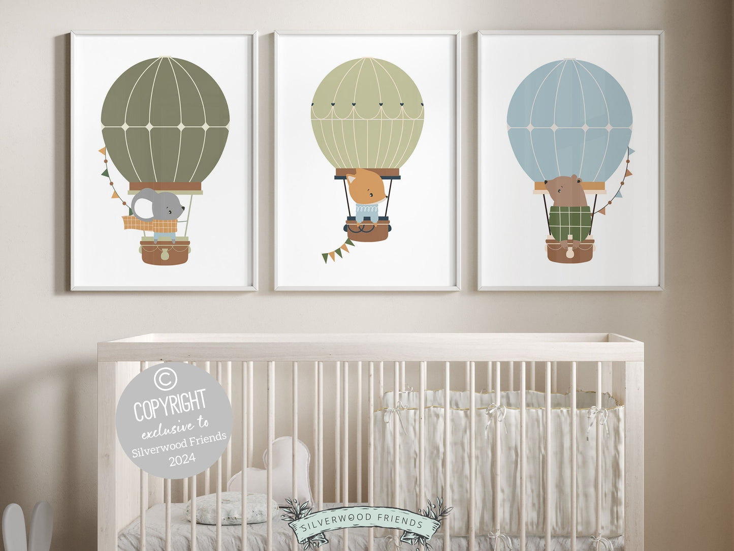 Hot Air Balloon Nursery Prints featuring woodland animals bear, mouse and fox in hot air balloons in a calming blue, green and beige color palette. Perfect for your woodland nursery decor or transport theme room and makes a unique baby shower gift.