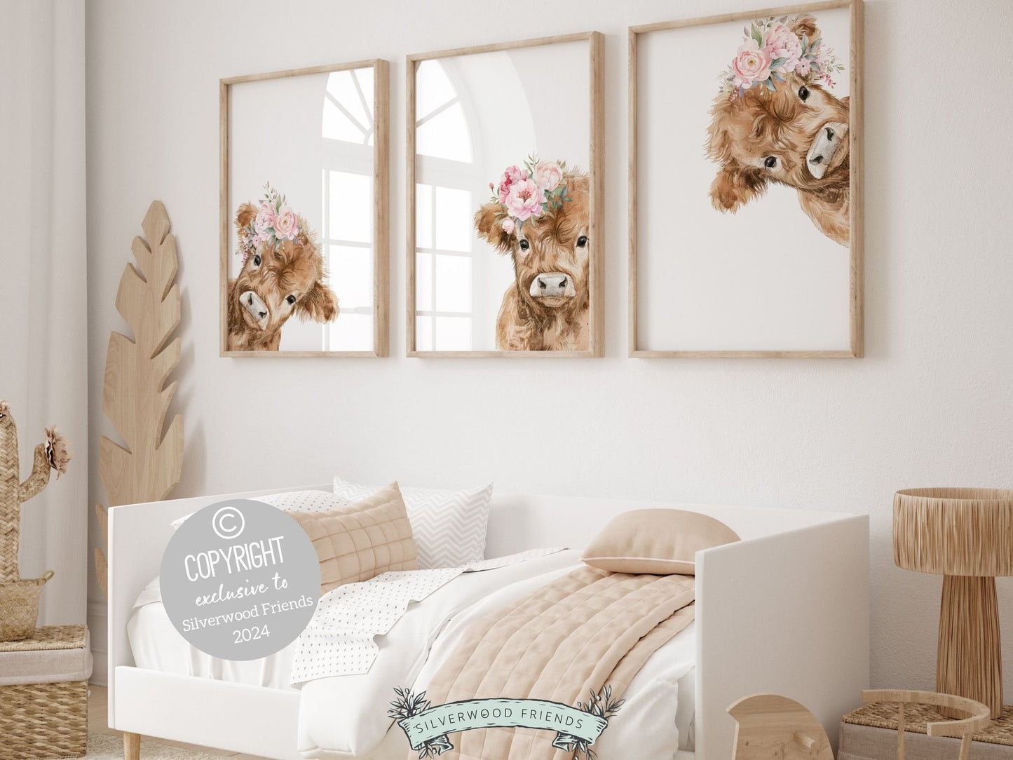 Our Peeking Highland Cow Nursery Prints features adorable watercolor peeking baby highland cows with pink floral crowns, set on a white background and is perfect for your baby girls farm nursery decor or as a unique farm baby shower gift.