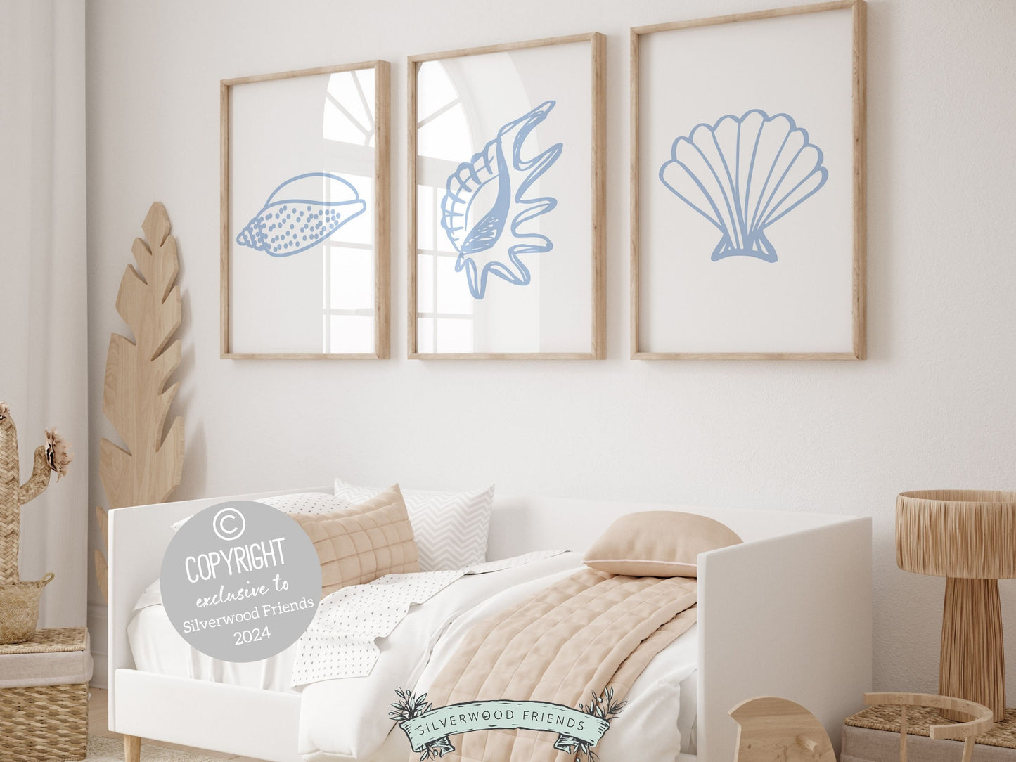 Set of 3 Seashell Prints featuring blue minimalist seashells, ideal for your beach house or coastal kids room wall decor. Our charming prints also make a thoughtful and unique beachy baby shower gift, adding a serene coastal touch to any space.