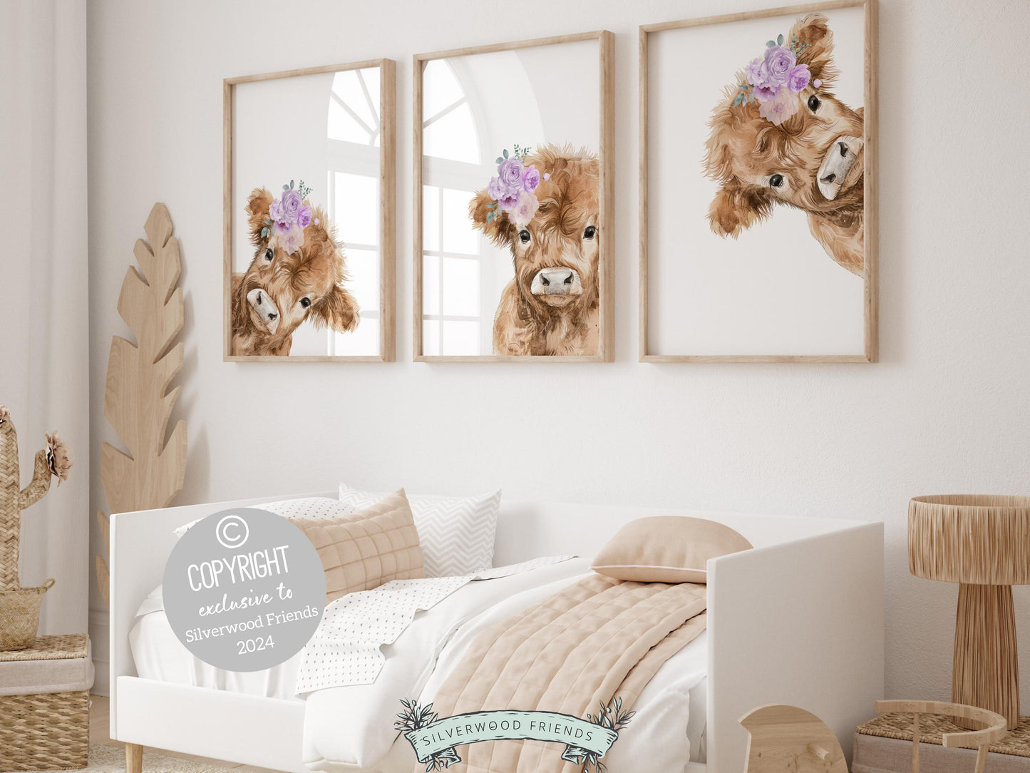 Our Peeking Highland Cow Nursery Prints features adorable watercolor peeking baby highland cows with purple floral crowns and set on a white background.