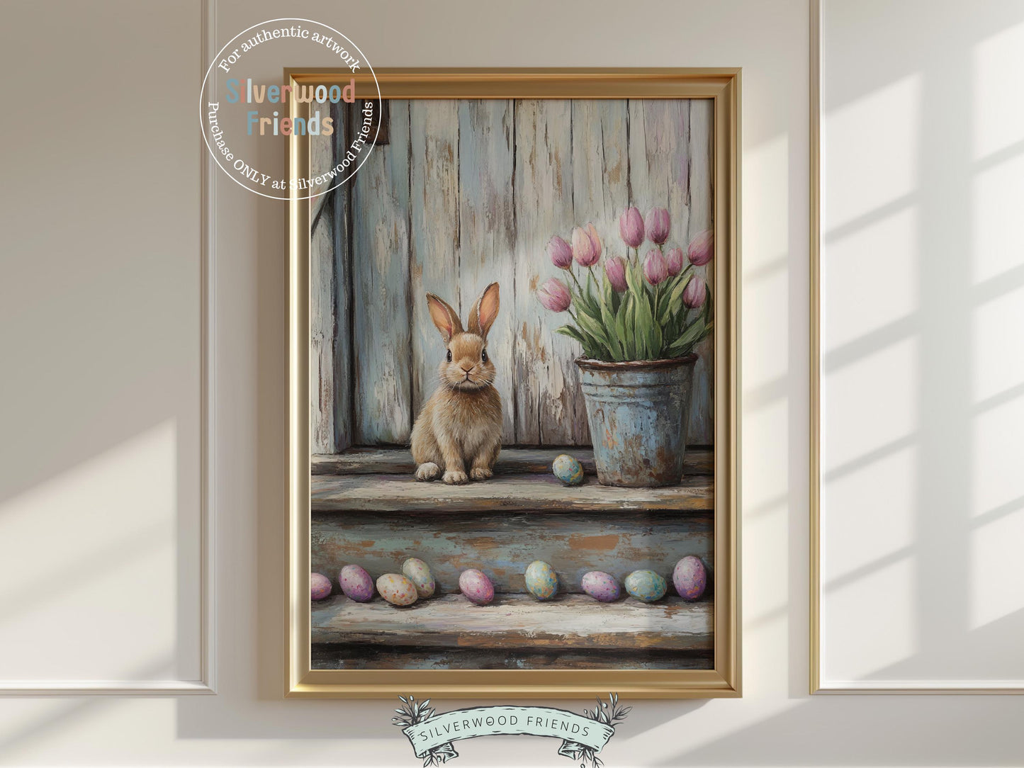 Bring a touch of Easter charm to your home with our gorgeous Bunny Nursery Print, showcasing a sweet bunny rabbit peacefully sitting on a rustic farmhouse step beside a bucket of tulips and Easter eggs, all in a soft oil painting style. Perfect as cozy Easter decor or a thoughtful Easter gift, it also adds a lovely, whimsical touch to any woodland or wildflower themed nursery.