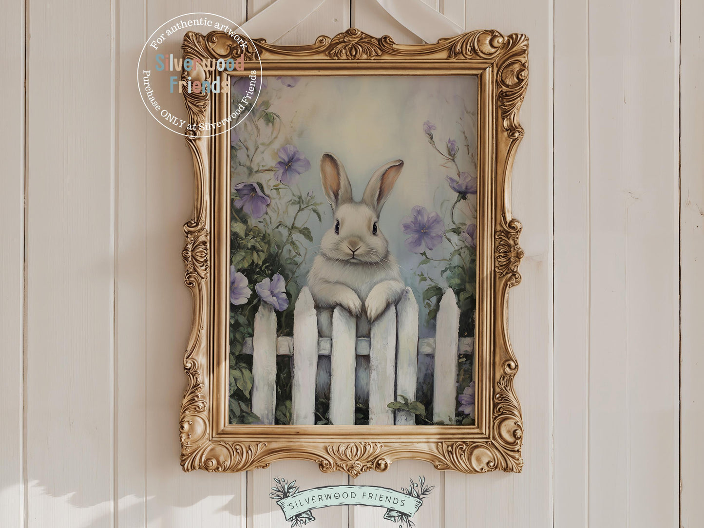 Add a touch of whimsy to your space with our charming Bunny Nursery Print, showcasing a sweet bunny rabbit peeking over a rustic country fence, surrounded by soft purple wildflowers in a gentle oil painting style. Ideal for cozy Easter decor or a woodland wildflower themed nursery, it also makes a unique and heartfelt baby shower gift.