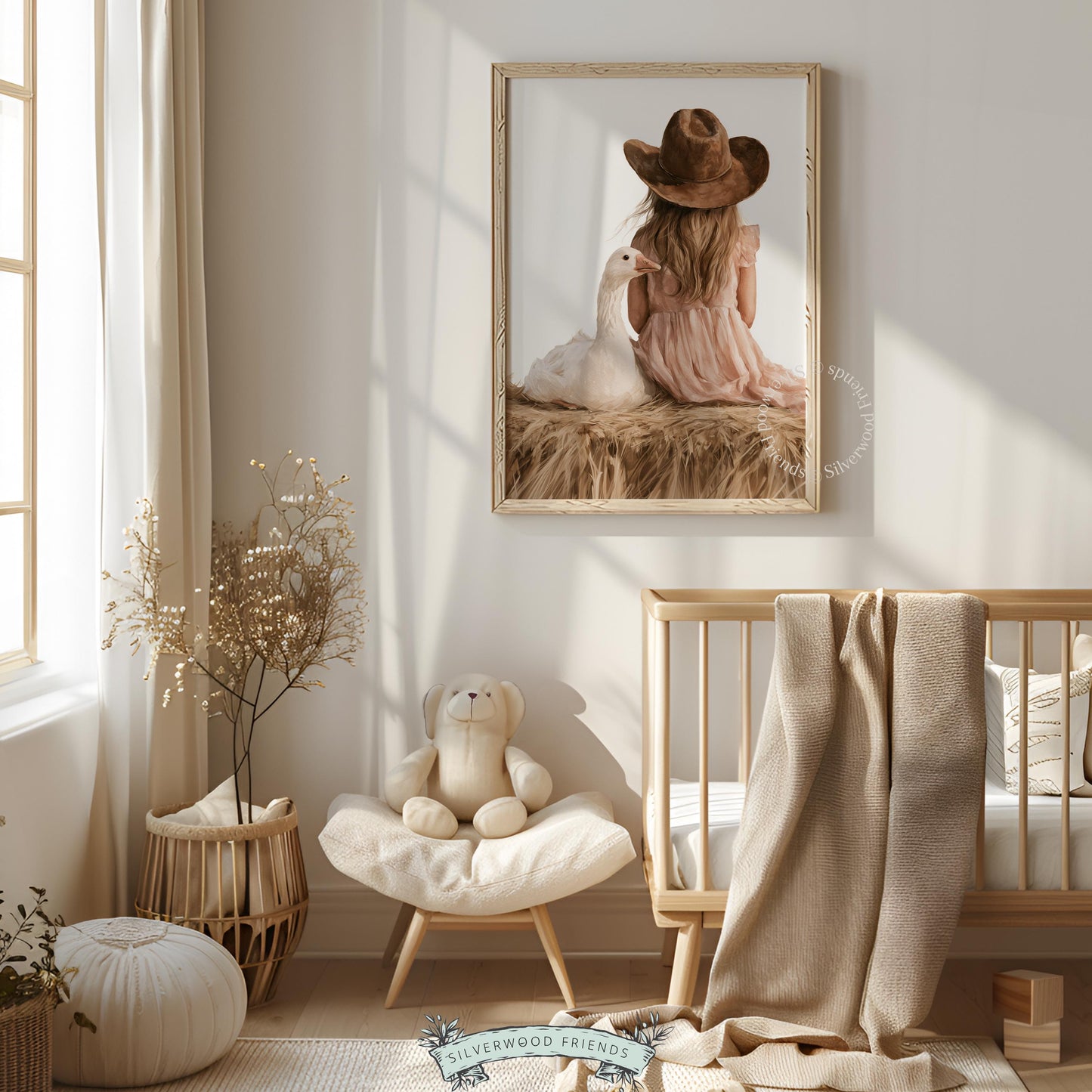 Blonde child seated on hay bale wall art for baby room — peaceful countryside scene in dusty pink and brown tones