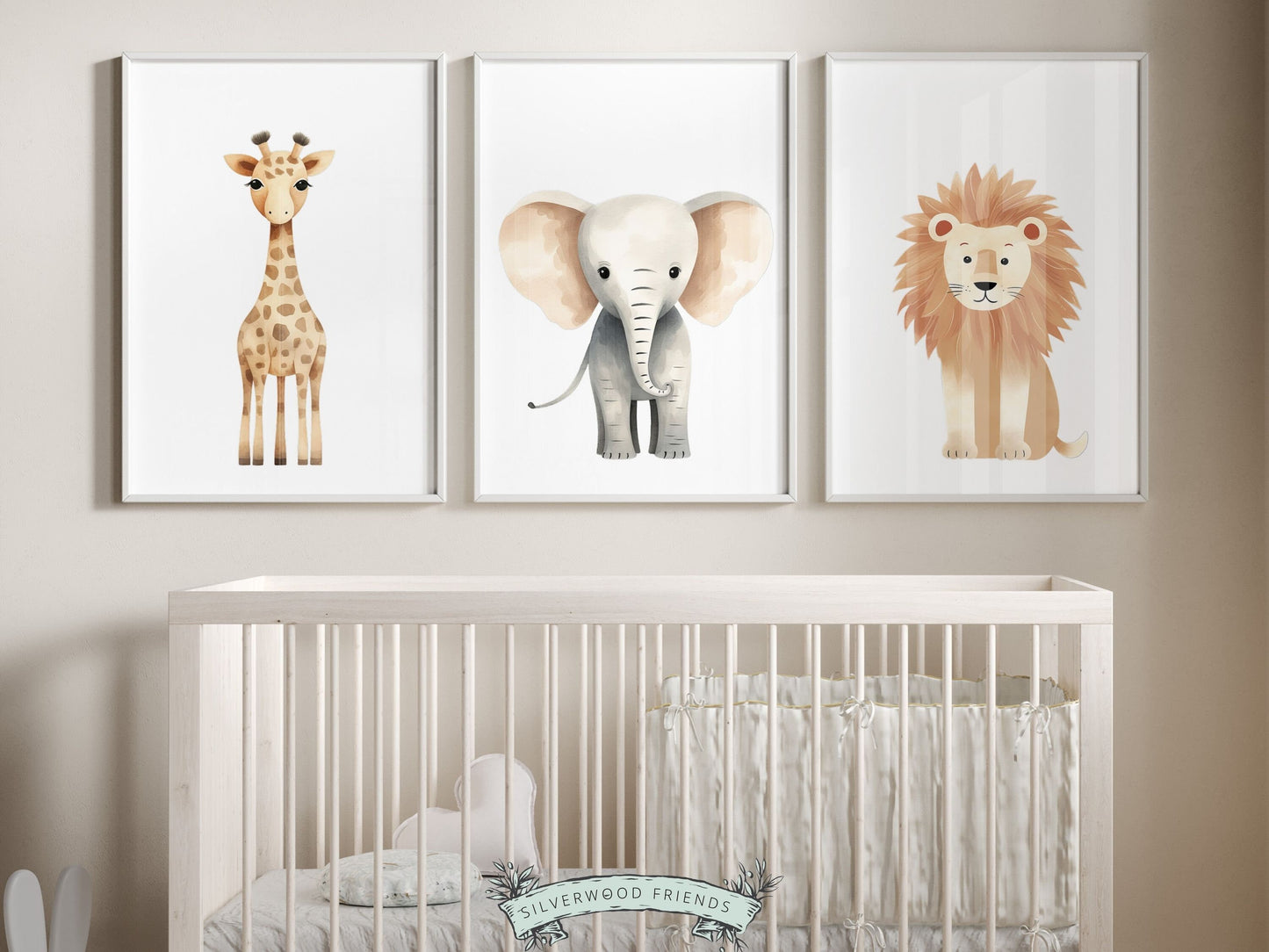 Our Safari Animal Nursery Prints featuring adorable watercolor illustrations of a giraffe, elephant, and lion, is the perfect addition for your safari nursery decor and also makes a lovely gender neutral baby shower gift.