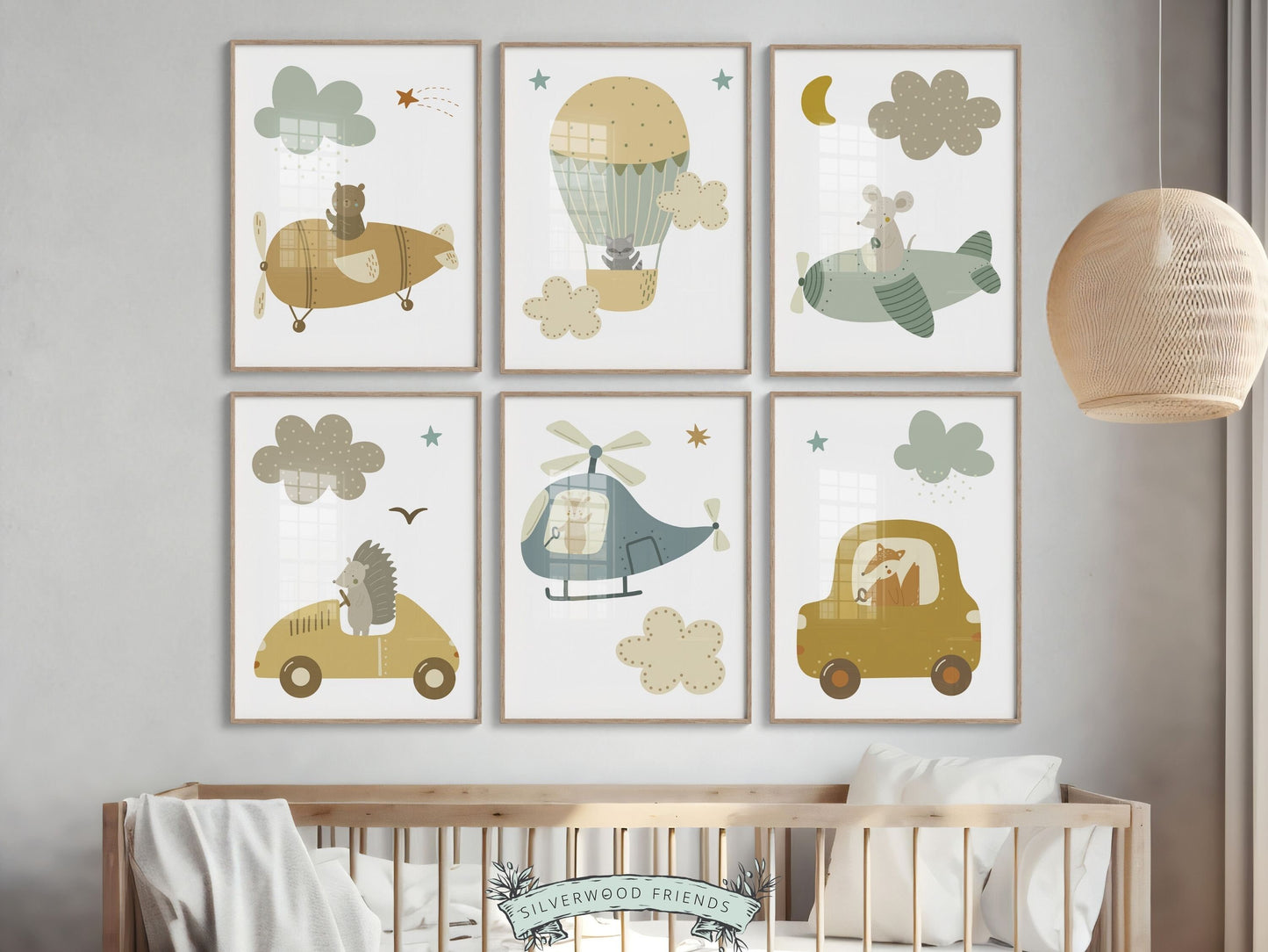 Set of 6 Woodland Transport Nursery Prints. Adorned with endearing woodland animals cruising in cars, planes and a hot air balloon surrounded by clouds, each print boasts a soothing blue and beige palette. Perfect for your baby boys nursery decor.