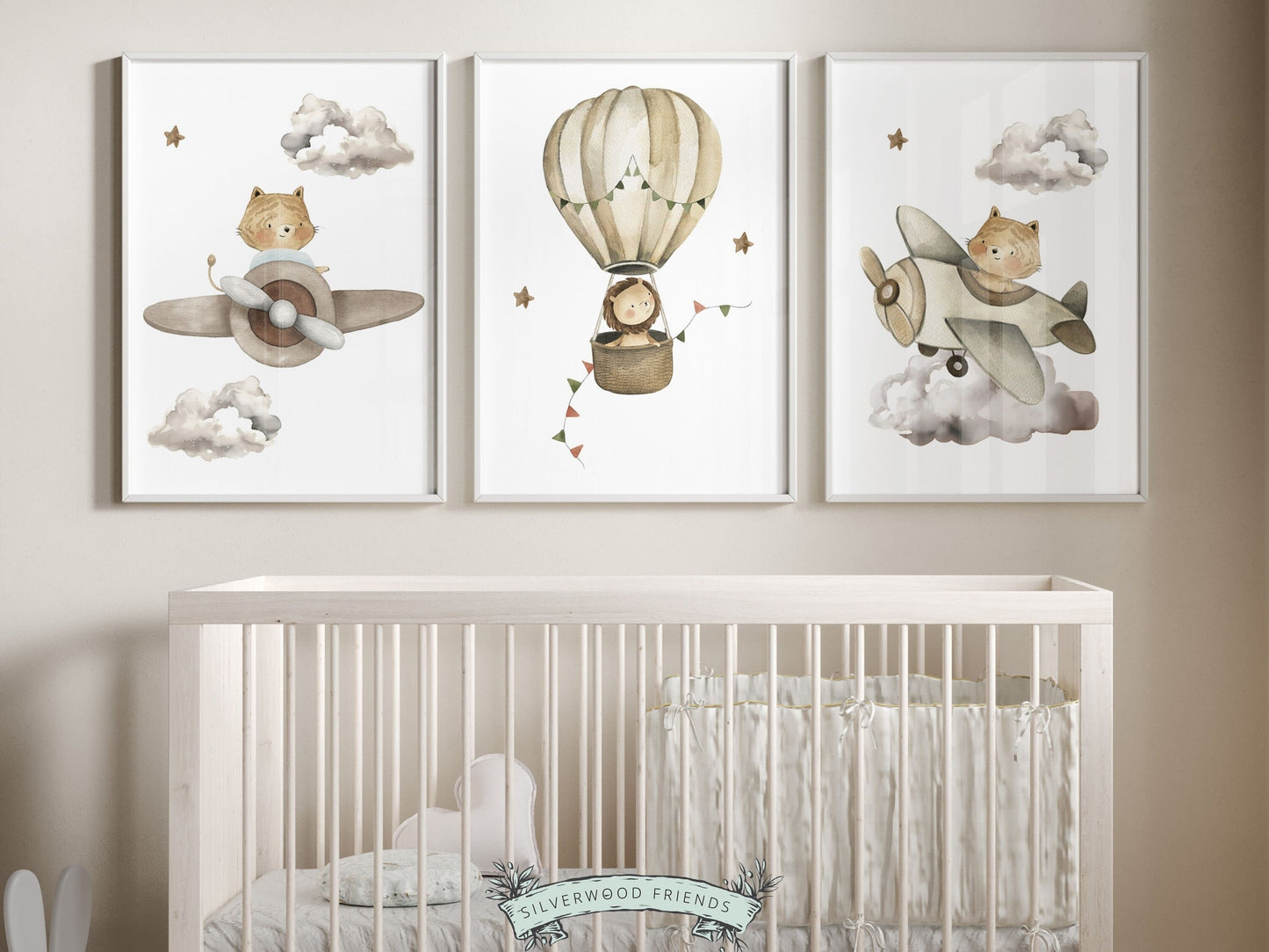 Hot Air Balloon Nursery Prints featuring watercolor safari animals in a hot air balloon and airplanes in a calming neutral color palette. Perfect for your safari nursery decor and also makes a unique gender neutral baby shower gift.