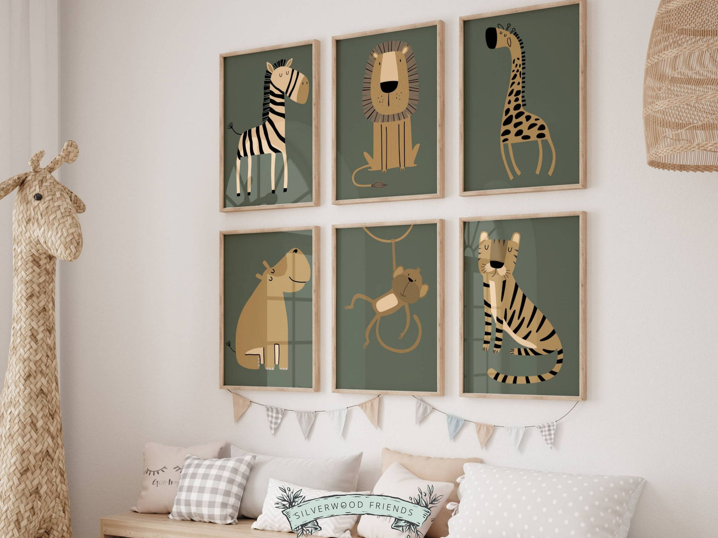 Our Boho Safari Animal Nursery Prints with jungle animals zebra, lion, giraffe, hippo, monkey and tiger is set on a green background and perfect for your jungle nursery decor and as a safari baby shower gift.