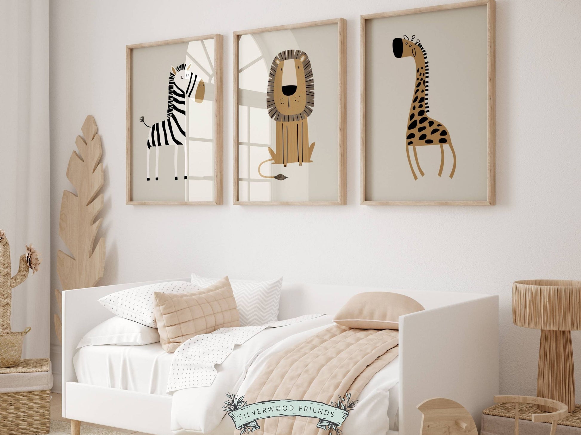 Our Boho Safari Animal Nursery Prints with jungle animals zebra, lion and giraffe is set on a beige background and perfect for your jungle nursery decor or as a new baby gift. It's part of our BEST SELLING safari nursery collection by Silverwood Friends.