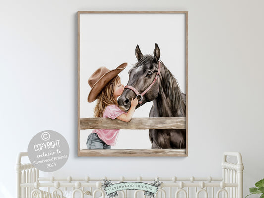 watercolour print, depicting a cowgirl kissing her black horse atop a paddock fence. Perfect for cowgirl themed decor or as a heartfelt baby shower gift for horse riding enthusiasts.