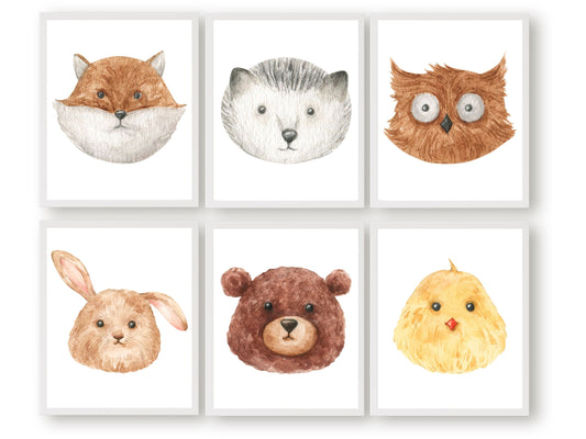 Our watercolour Woodland Animal Faces Nursery Prints Set of 6 featuring woodland animal faces of a fox, wolf, bear, bunny, owl and chicken is the perfect addition to your babys woodland nursery decor or as a neutral baby shower gift.