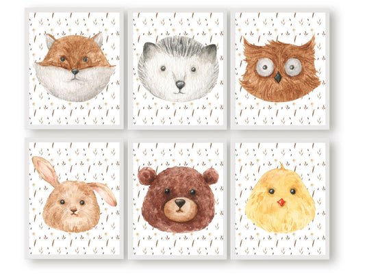 Our watercolor Woodland Animal Faces Nursery Prints featuring woodland animal faces of a fox, wolf, bear, bunny, owl and chicken with woodland flowers is the perfect addition to your babys woodland nursery decor or floral boho baby nursery.