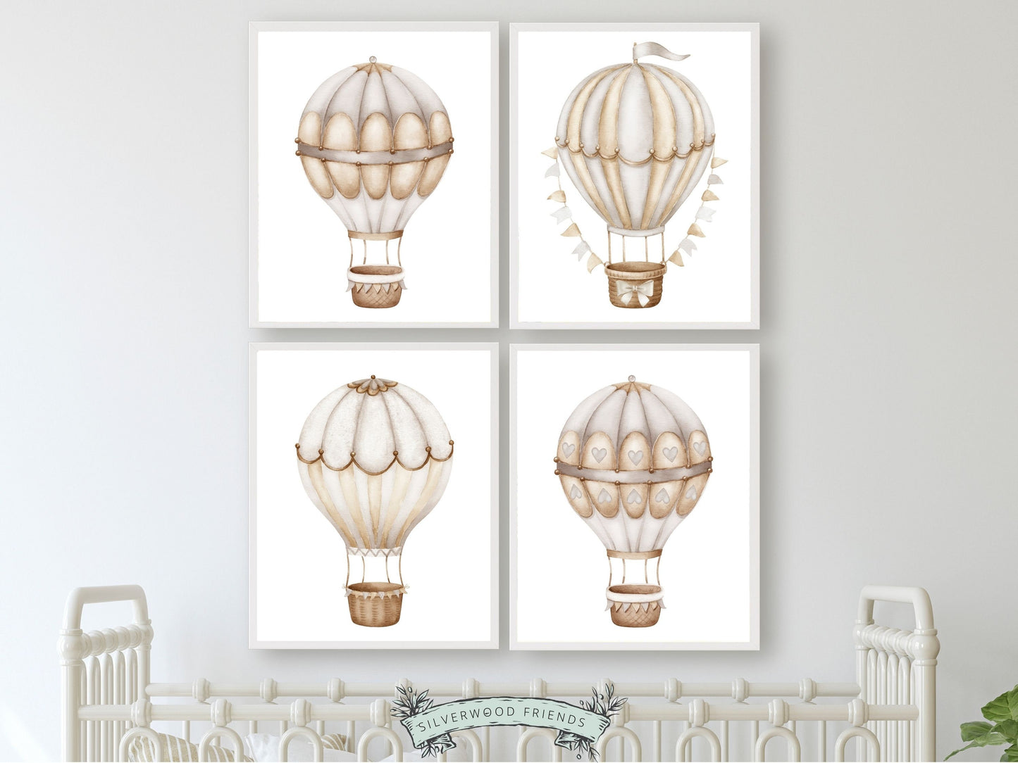 Set of 4 Hot Air Balloon Nursery Prints featuring watercolor hot air balloons in a calming neutral color palette. Perfect for your safari nursery decor or transport nursery and also makes a unique gender neutral baby shower gift.