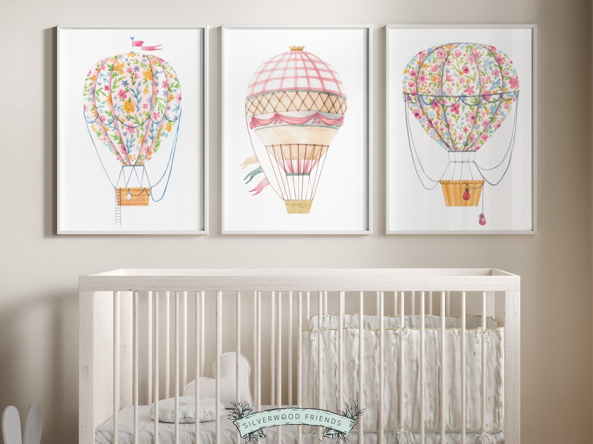Set of 3 Pink Hot Air Balloon Prints. Whether adorning a nursery or adding a pop of color to a dorm room, these vibrant prints are as playful as they are versatile, making them perfect for both personal decor and thoughtful gifts for any occasion.