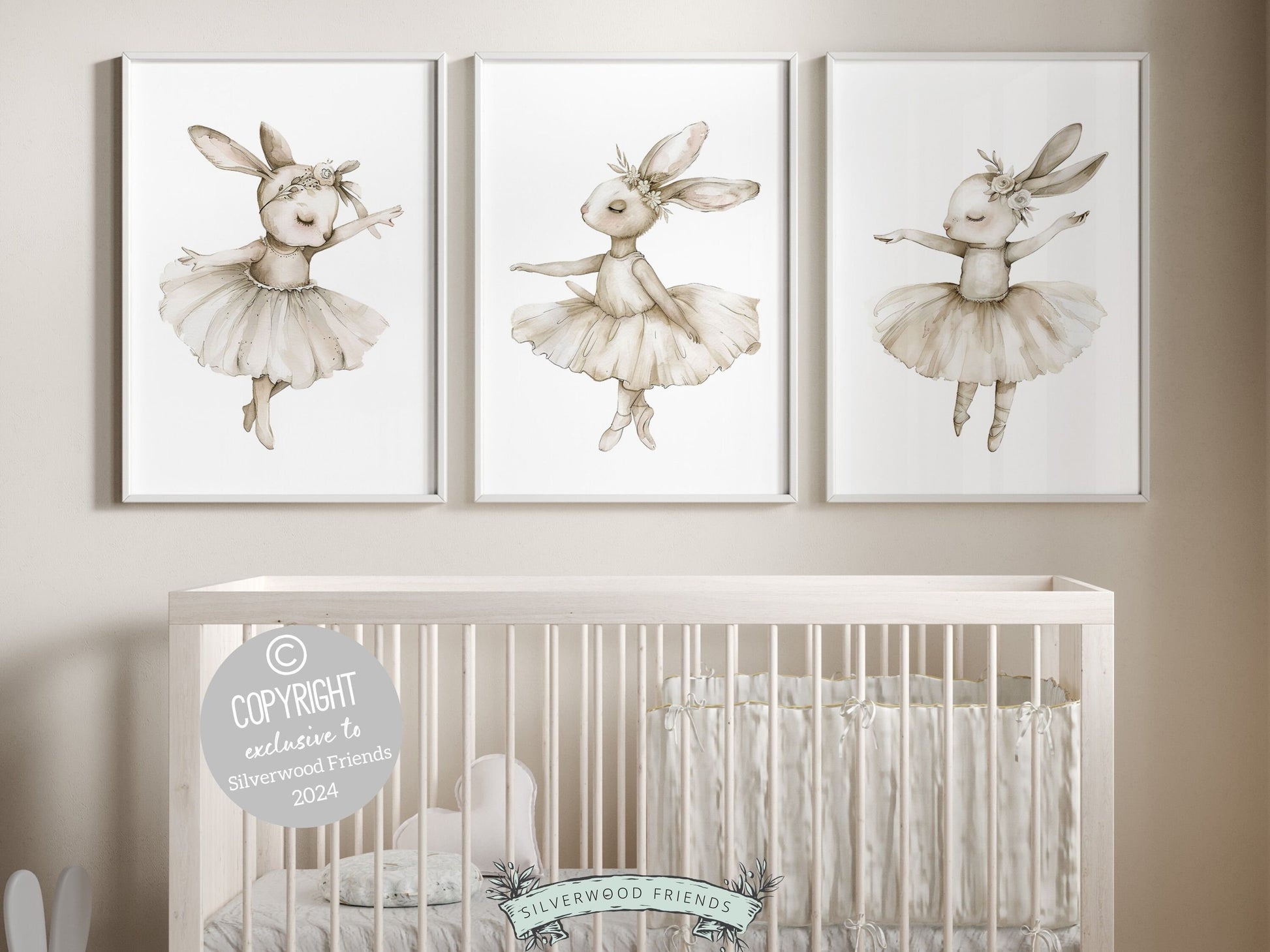 Bunny Ballet Nursery Prints showcasing adorable dancing ballerina bunny rabbits with floral crowns. Perfect for adding a touch of magic to your little girl&#39;s ballet themed nursery decor or as a unique baby shower gift.