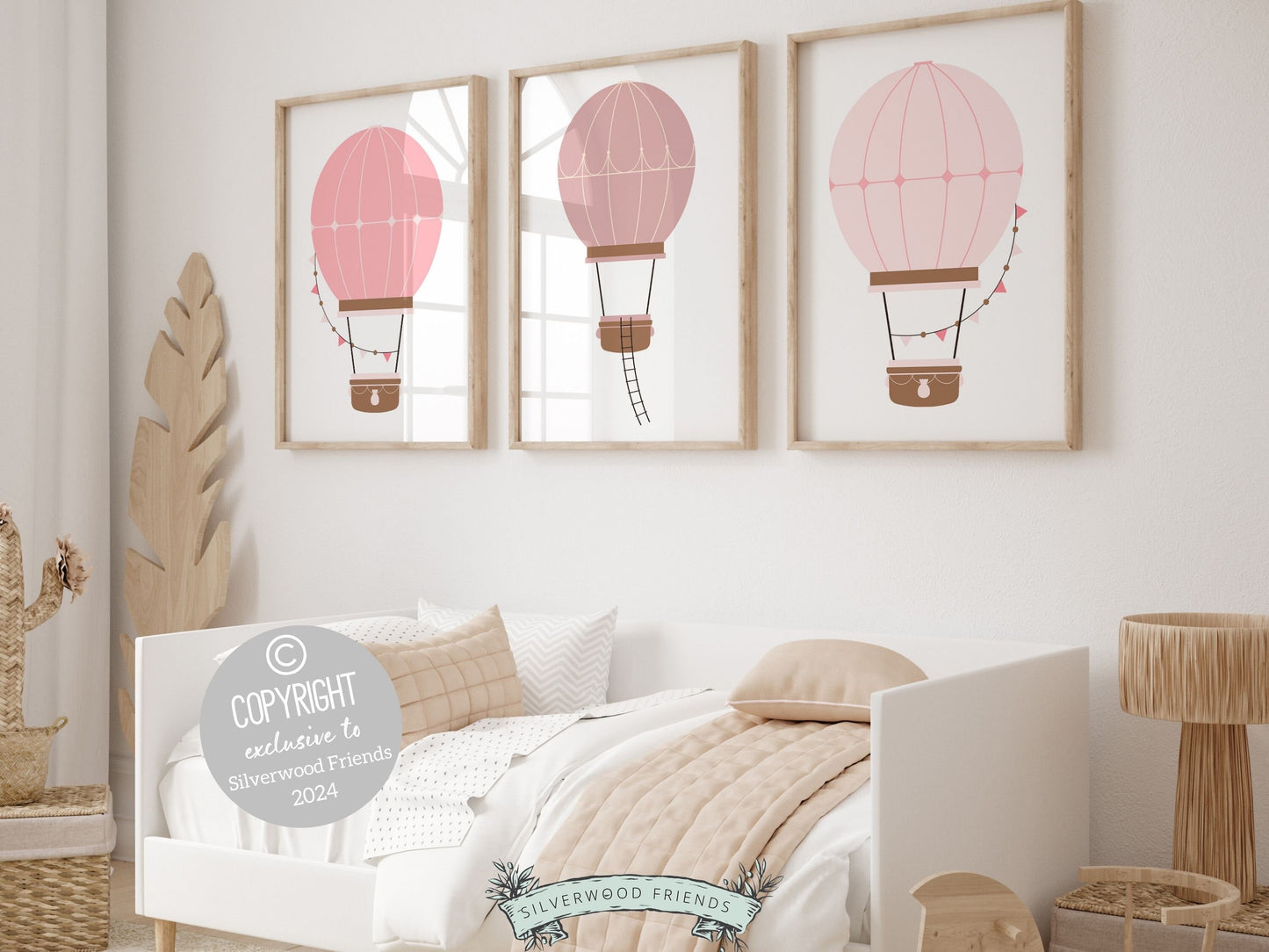 Hot Air Balloon Nursery Prints, featuring charming hot air balloons in soothing blush pink tones. Perfect for your baby girls adventure nursery and also as a unique and thoughtful baby shower gift.