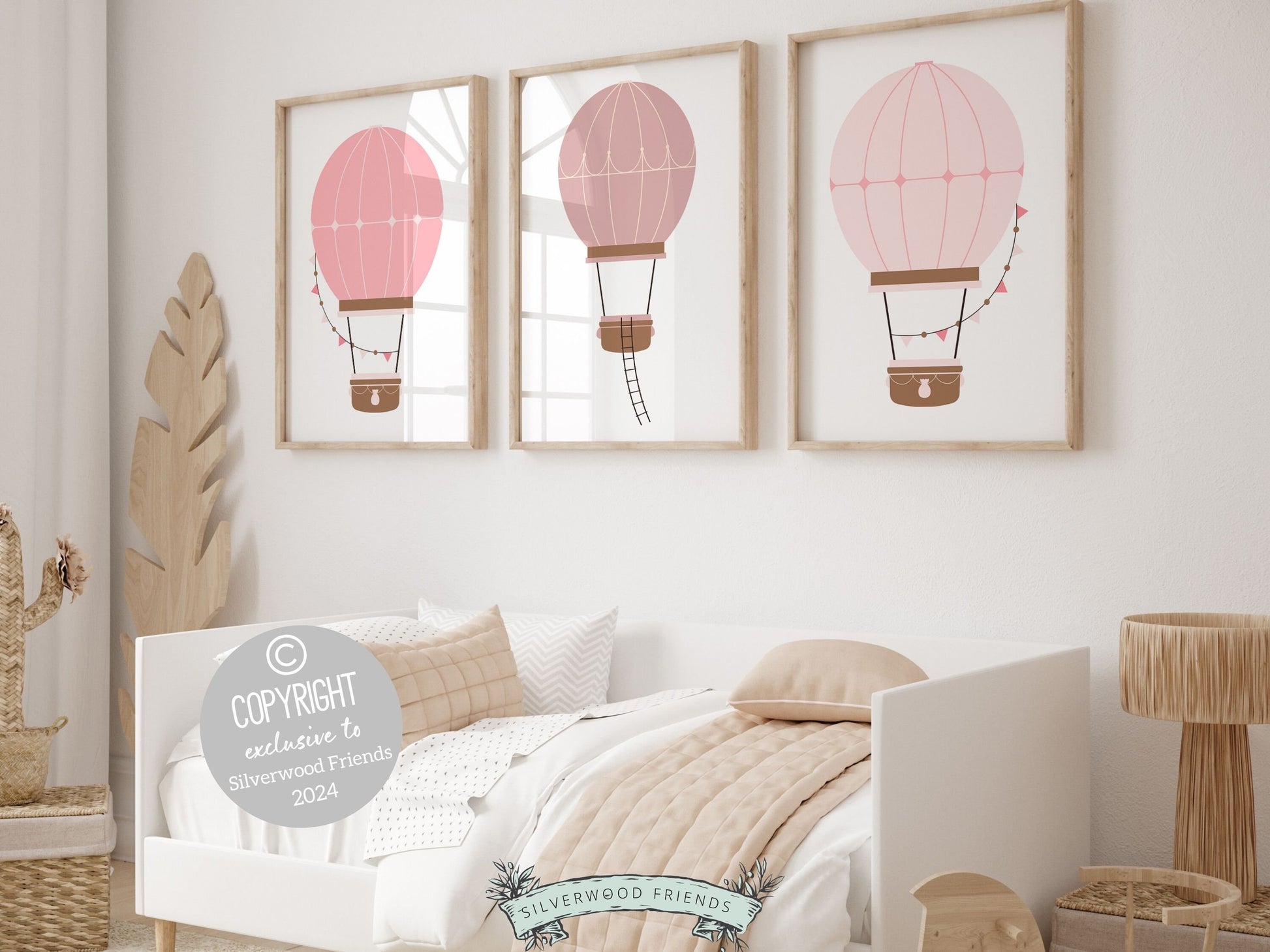 Hot Air Balloon Nursery Prints, featuring charming hot air balloons in soothing blush pink tones. Perfect for your baby girls adventure nursery and also as a unique and thoughtful baby shower gift.