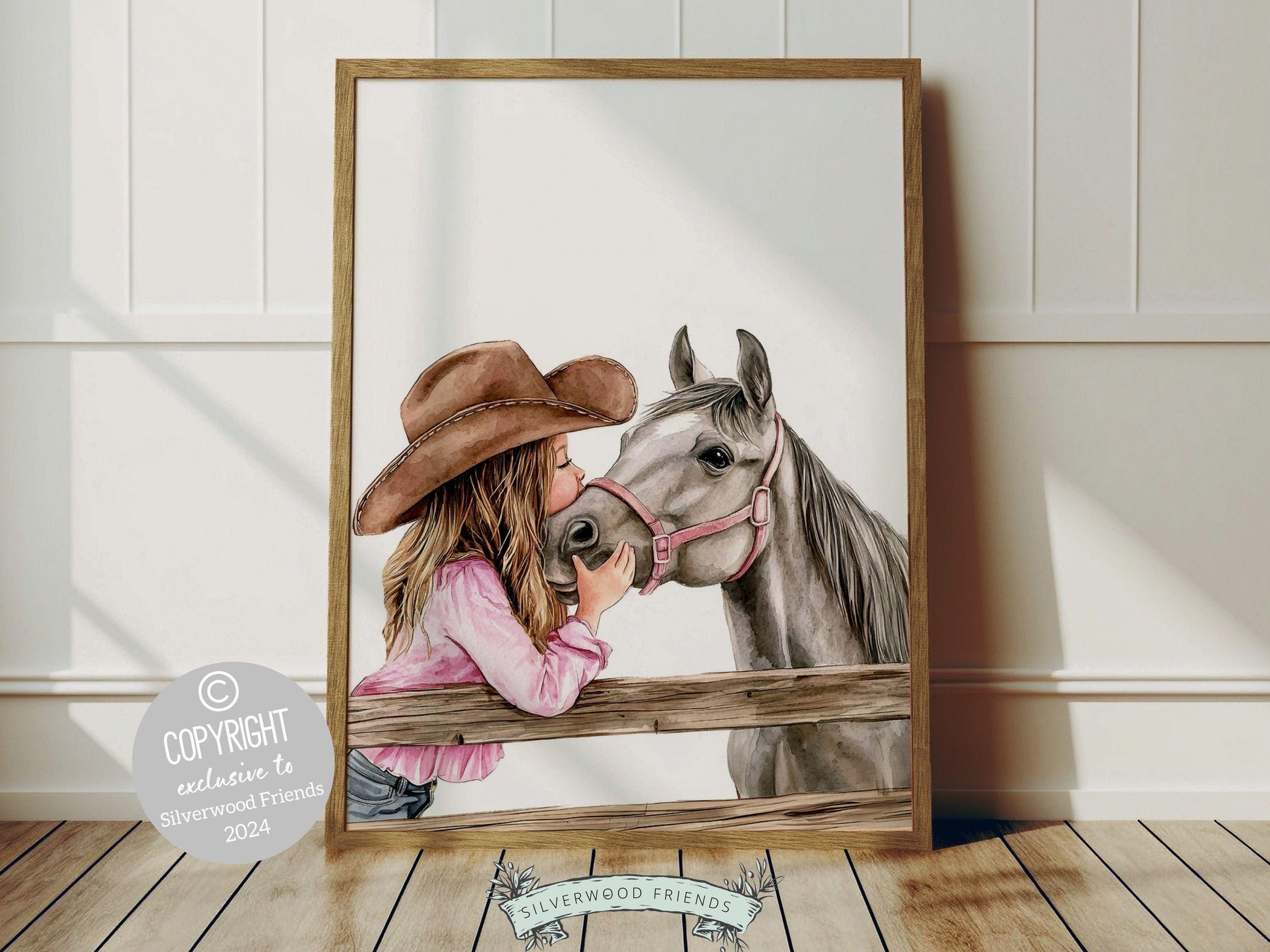 Watercolor print, depicting a cowgirl kissing her grey horse atop a paddock fence. Perfect for cowgirl themed decor or as a heartfelt baby shower gift for horse riding enthusiasts.