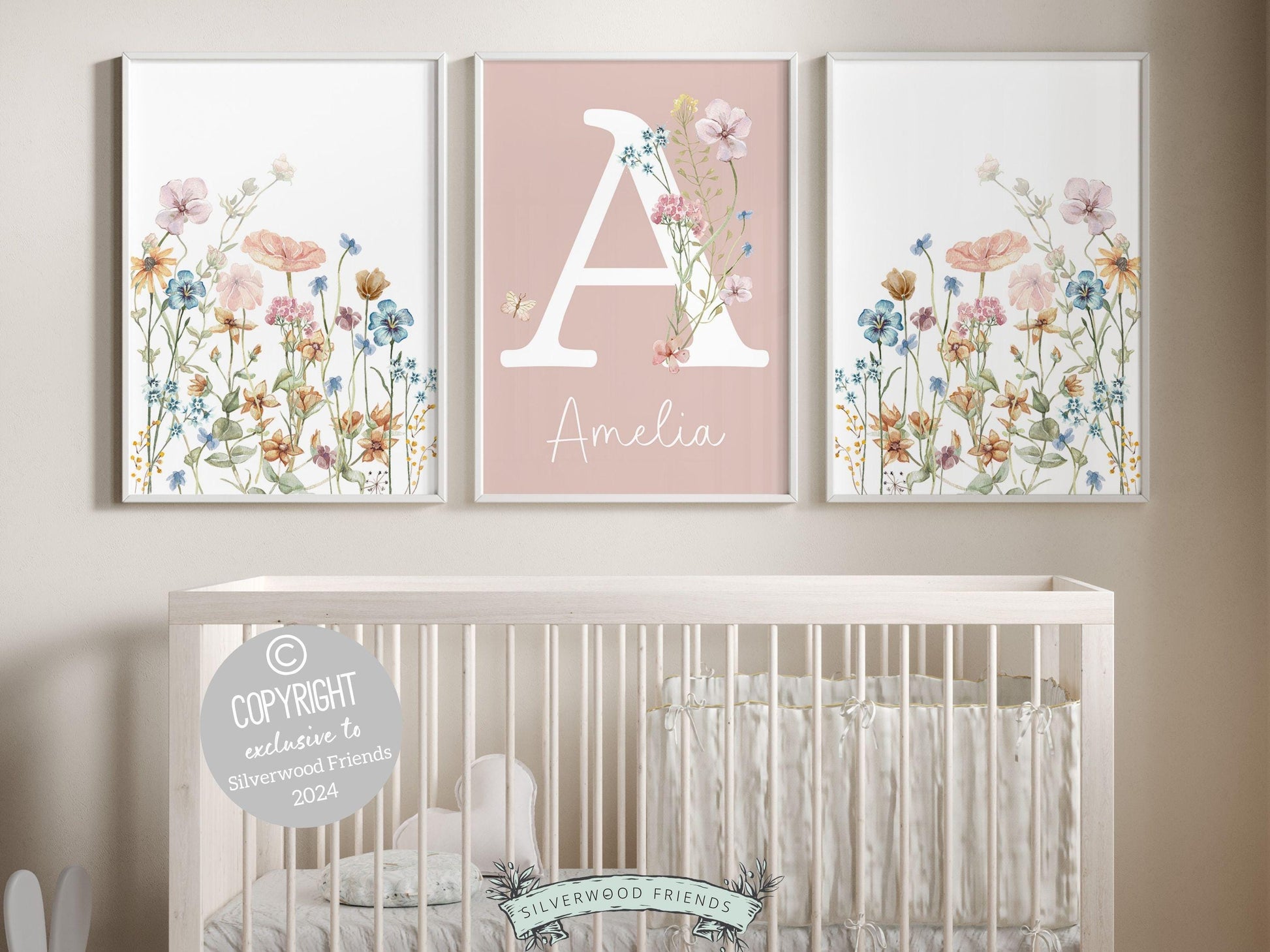 Our gorgeous custom wildflower nursery name prints with watercolor pink and blue wildflowers and butterfly are perfect as a custom nursery print set for your new baby or as a unique baby shower gift.