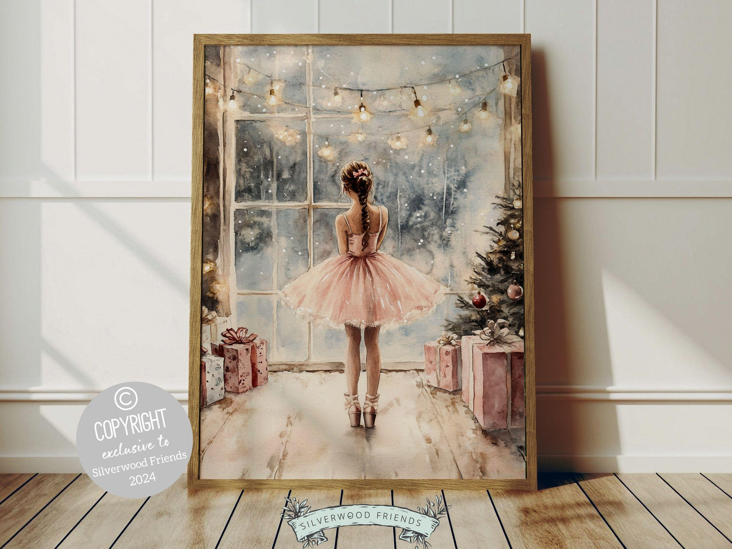 Our charming ballerina Christmas print showcases a sweet little ballerina in a pink tutu, standing under twinkling fairy lights by a Christmas tree and gazing at the falling snow. The perfect gift for a young ballet lover or a babys first Christmas.