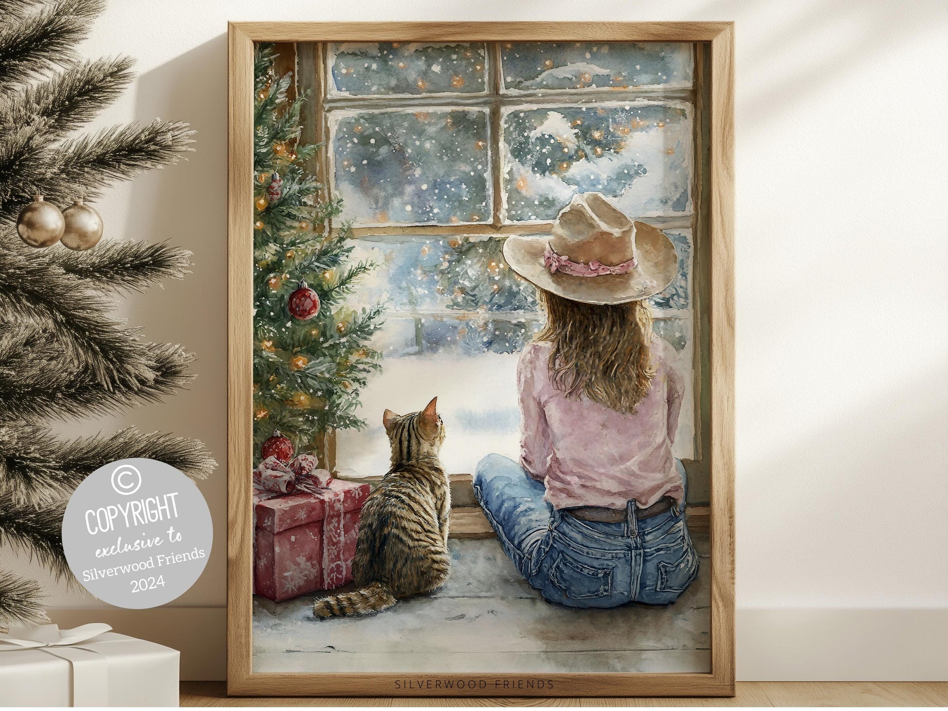 Add a touch of Western magic to your home with this whimsical cowgirl Christmas print, featuring a festive cowgirl and her curious cat by a stack of Christmas gifts, dreaming by the window as snowflakes dance outside