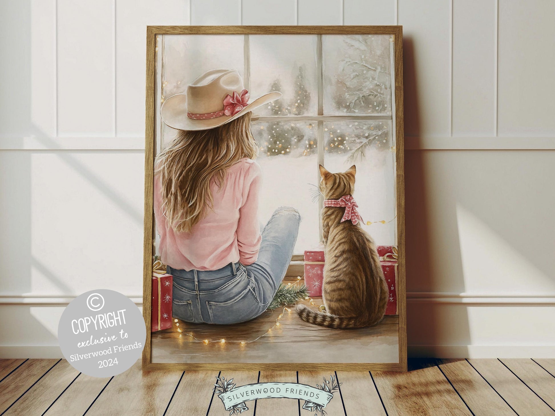 Add a touch of Western magic to your home with this whimsical cowgirl Christmas print, featuring a festive cowgirl and her curious cat by a stack of Christmas gifts, dreaming by the window as snowflakes dance outside