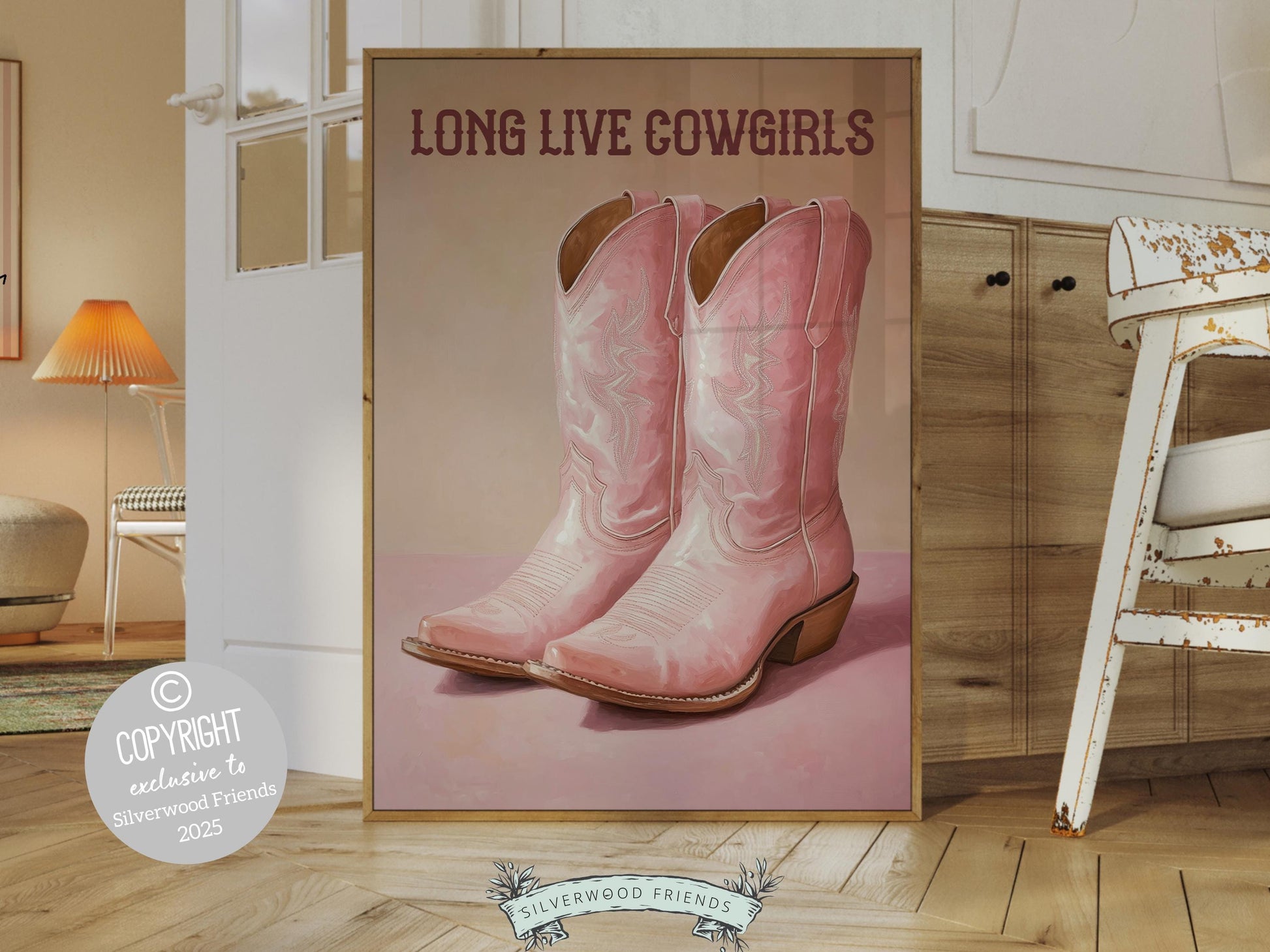 Cowgirl Boots Print, featuring soft pink and beige watercolor boots alongside the quote Long Live Cowgirls.  Perfect for country themed decor, this stylish artwork makes a lovely addition to a nursery, teen room, or any cowgirl inspired space!