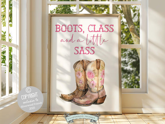 Pink Cowgirl Print, featuring cowgirl boots and quote Boots, Class and a Little Sass. Perfect for country themed decor, this stylish artwork makes a lovely addition to a nursery, teen room, or any cowgirl inspired space!