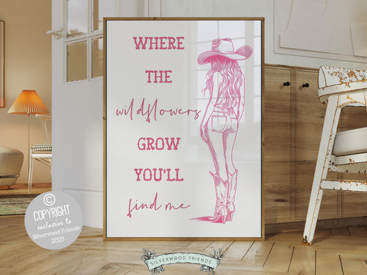 Pink Cowgirl Print, featuring a pink cowgirl and quote Where the wildflowers grow you&#39;ll find me. Perfect for country themed decor, this stylish artwork makes a lovely addition to a nursery, teen room, or any cowgirl inspired space!