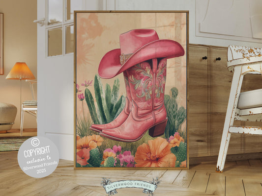 Cowgirl Boots Print, featuring colorful pink cowgirl boots and hat with a vibrant floral design. Perfect for country themed decor, this stylish artwork makes a lovely addition to a nursery, teen room, or any cowgirl inspired space!