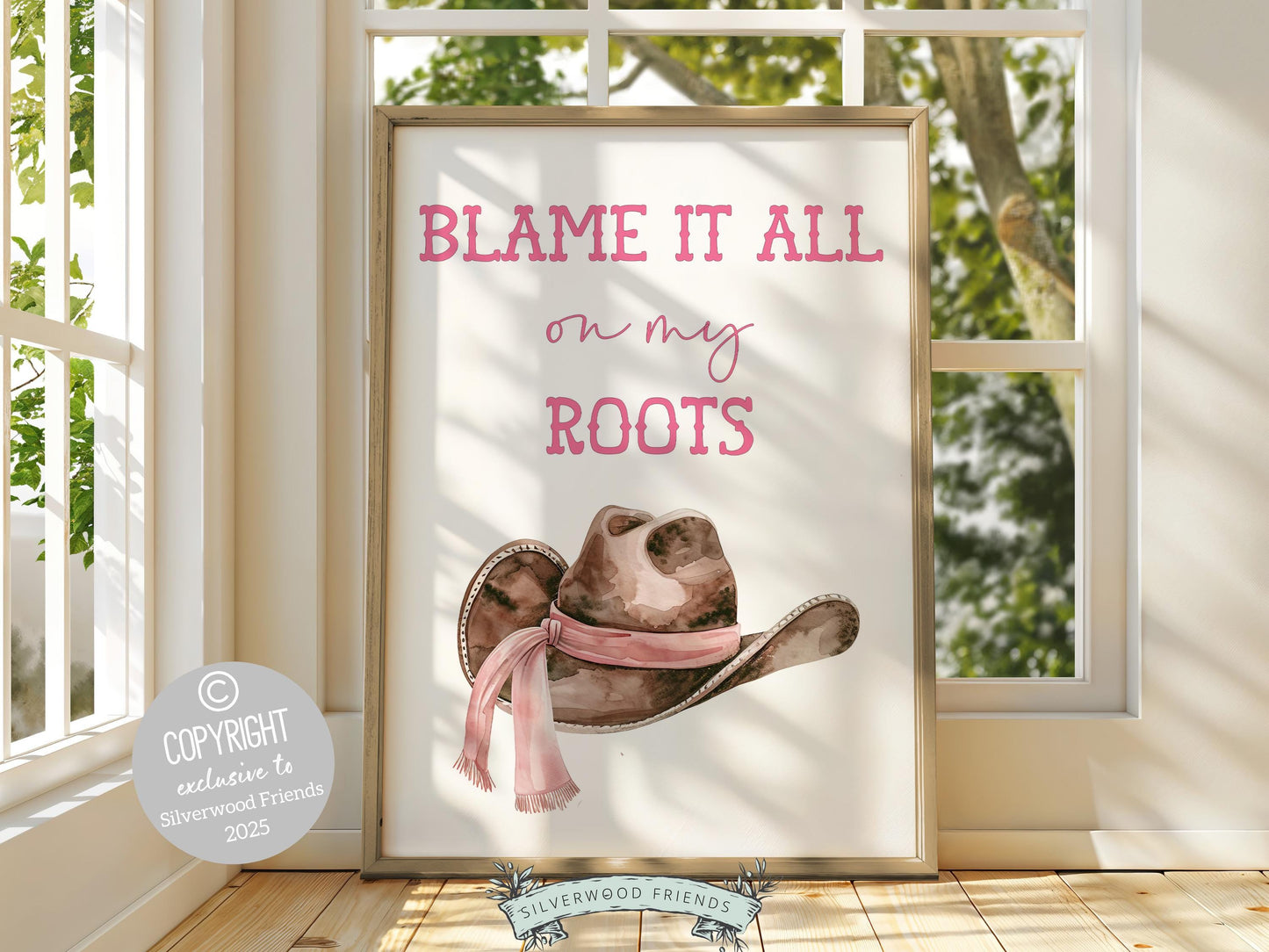 Pink Cowgirl Print, featuring a cowgirl hat and quote Blame it all on my roots. Perfect for country themed decor, this stylish artwork makes a lovely addition to a nursery, teen room, or any cowgirl inspired space!