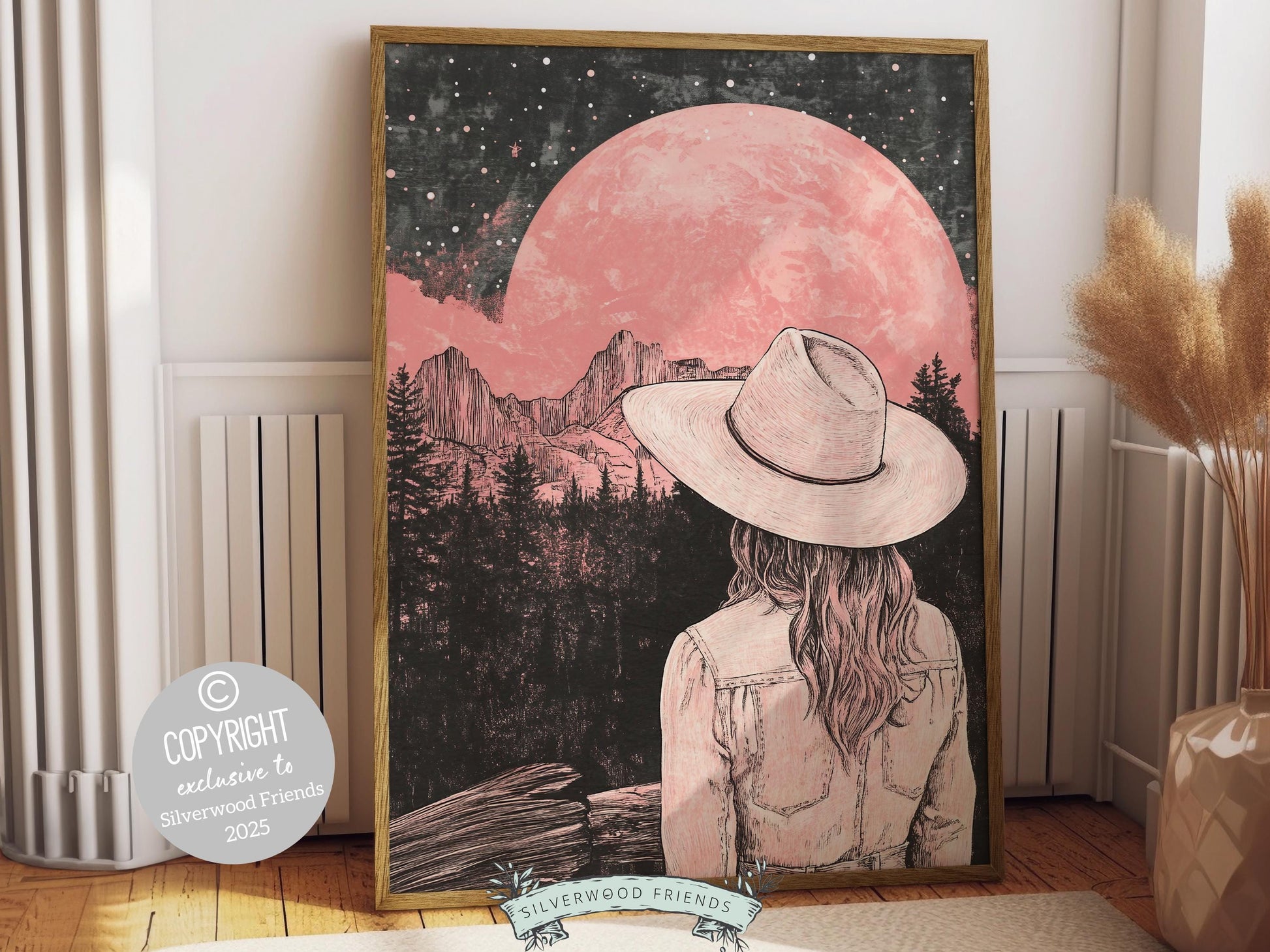 Cowgirl print, featuring a lone cowgirl gazing across the desert beneath a glowing full moon. Designed in rich black and pink tones, this artwork is perfect for a southwestern nursery, dorm room, or as a unique gift for any cowgirl at heart!