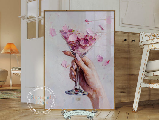 Celebrate in style with our Cheers Art Print, featuring a chic illustration of a girl&#39;s hand holding a cocktail glass filled with vibrant flower petals. Perfect for social gathering spaces or trendy bar cart decor, this colorful artwork adds a fun, lively touch to your home.
