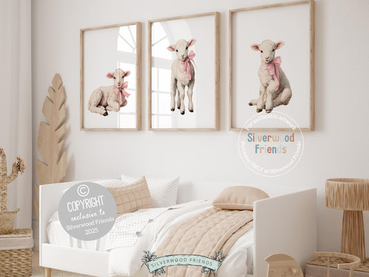 Our delightful minimalist Set of 3 Lamb Nursery Prints features adorable baby lambs in pink bows. Perfect for your baby girl&#39;s farmyard nursery decor and also makes a unique Spring or farm baby shower gift.