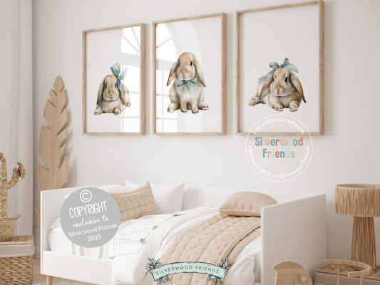 Our delightful minimalist Set of 3 Bunny Nursery Prints features adorable bunny rabbits in blue bows. Perfect for your baby boy&#39;s woodland nursery decor and also makes a unique baby shower gift.