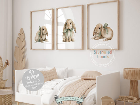 Our delightful minimalist Set of 3 Bunny Nursery Prints features adorable bunny rabbits in sage green bows. Perfect for your baby boy&#39;s woodland nursery decor and also makes a unique baby shower gift.