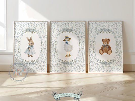 Our delightful Set of 3 Vintage Woodland Animal Nursery Prints features adorable bunny, duck and bear with gorgeous blue floral background. Perfect for your baby woodland nursery decor and also makes a unique gender neutral baby shower gift.