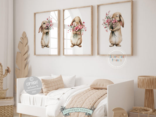 Our delightful Set of 3 Bunny Nursery Prints features adorable bunny rabbits with pink wildflower bouquets. Perfect for your baby girl's floral woodland nursery decor and also makes a unique baby shower gift.