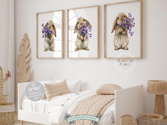 Our delightful Set of 3 Bunny Nursery Prints features adorable bunny rabbits with purple wildflower bouquets. Perfect for your baby girl's floral woodland nursery decor and also makes a unique baby shower gift.