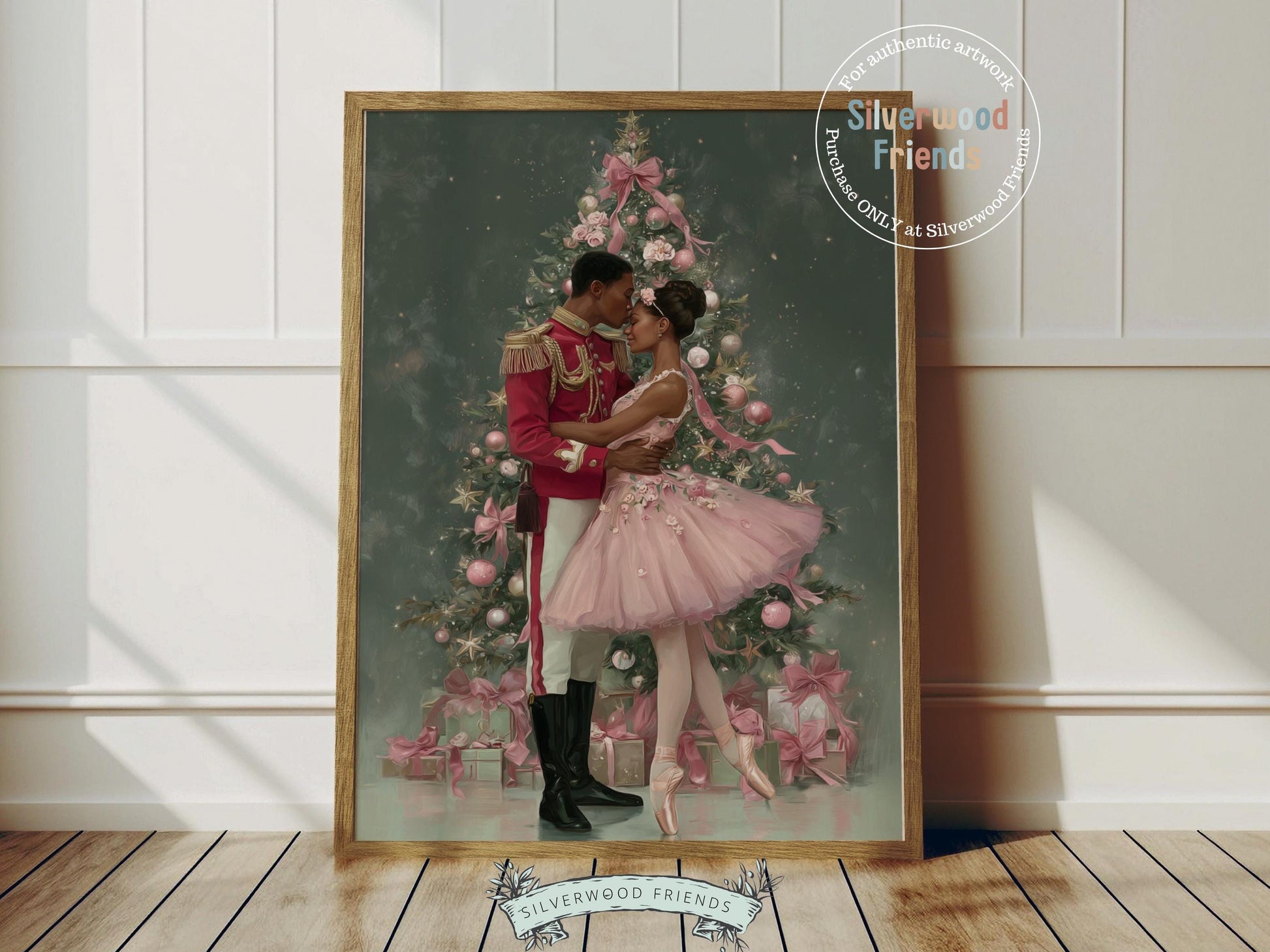 This enchanting Christmas ballet print captures a magical moment as a graceful African American ballerina dances with a Nutcracker soldier in front of a beautiful Christmas tree. The perfect gift for ballet lovers this print brings whimsical romance and festive charm to any space, making it delightful decor all year round!