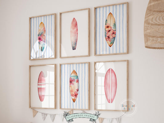 Enhance your decor with our versatile Set of 6 Pink Surfboard Prints featuring minimalist pink surfboards on a white/ blue and white striped background, ideal for your beach house or girls surfing room wall decor. Our charming prints also make a thoughtful and unique beachy baby shower gift, adding a serene coastal touch to any space.