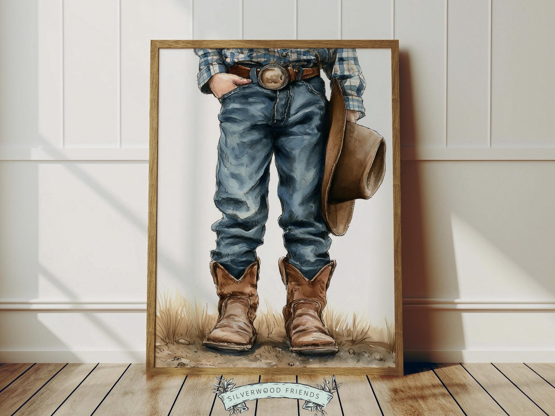 Capture the charm of the wild west with this adorable watercolor cowboy nursery print, featuring a sweet little cowboy holding his hat, illustrated from the waist down for a playful and timeless look. Designed with soft, rustic tones, this piece adds warmth and character to any space, making it a beautiful addition to western-inspired nurseries and farmhouse-style rooms.