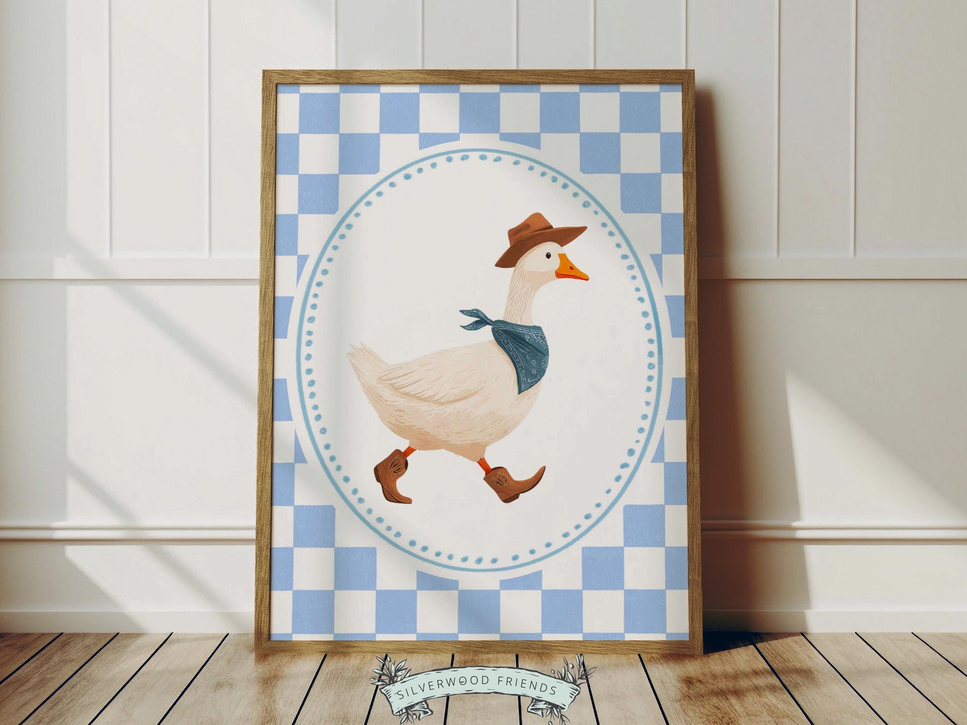 Add a playful western touch to your little one’s room with this charming Goose Cowboy Nursery Print. Framed with a soft blue and white checkered border, this whimsical print is perfect for cowboy nurseries, western-themed baby rooms, or as a unique baby shower gift that will be treasured for years to come. 🤠🪿
