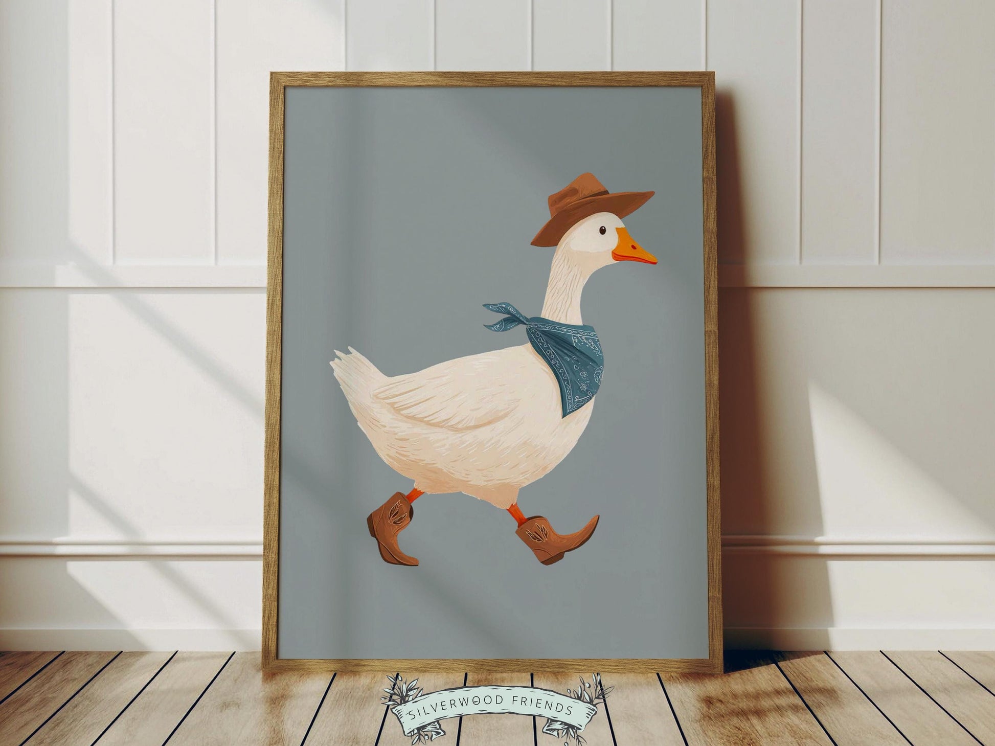 Add a playful western touch to your little one’s room with this charming Goose Cowboy Nursery Print. Framed with a soft dusty blue border, this whimsical print is perfect for cowboy nurseries, western-themed baby rooms, or as a unique baby shower gift that will be treasured for years to come. 🤠🪿